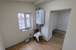 одноэтажный дом с гаражом, 60 кв. м, дерево и кирпич. Продажа в Виннице район Бучмы фото 2