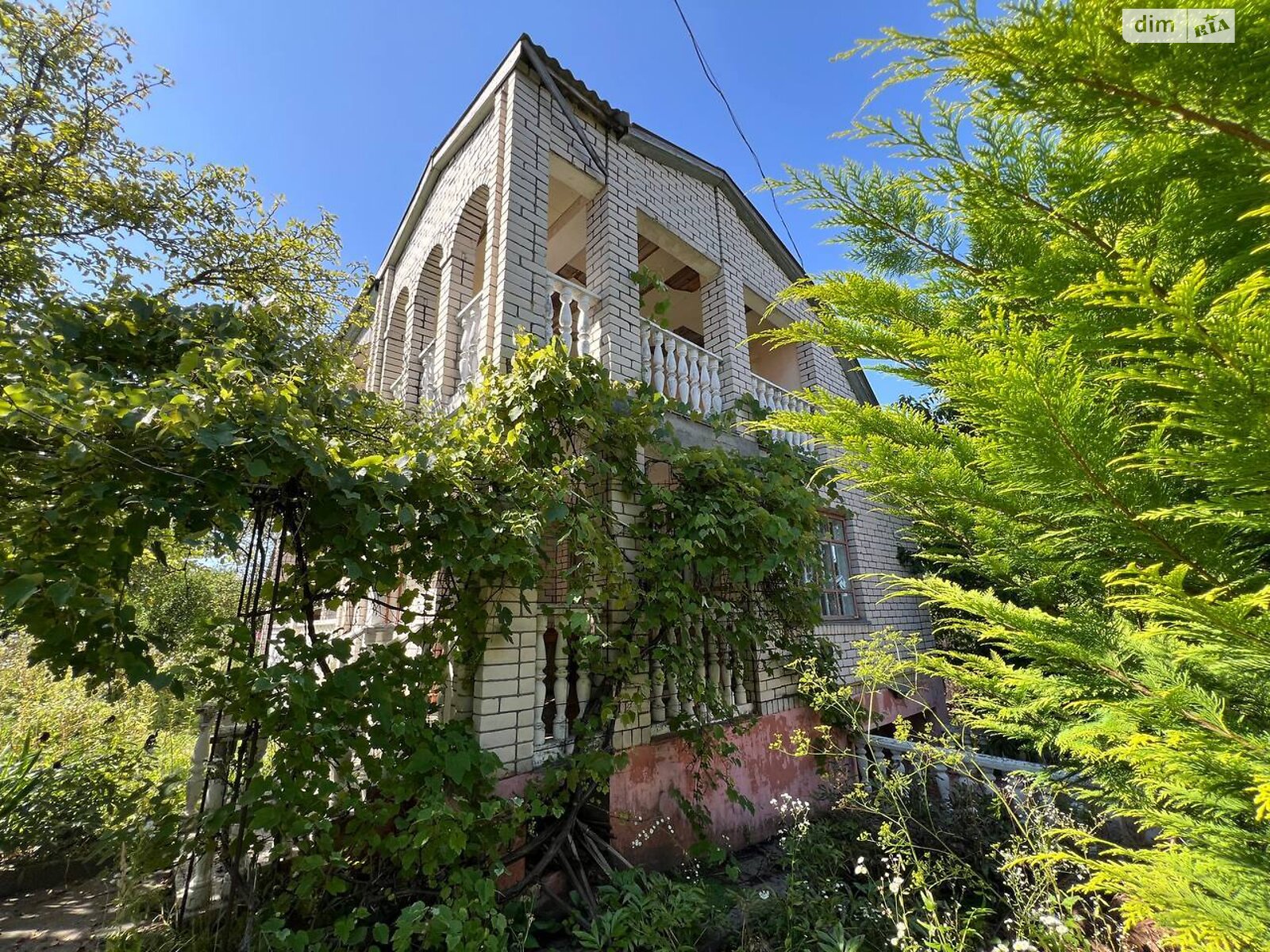 двухэтажный дом с гаражом, 109 кв. м, кирпич. Продажа в Выдровые Долы фото 1