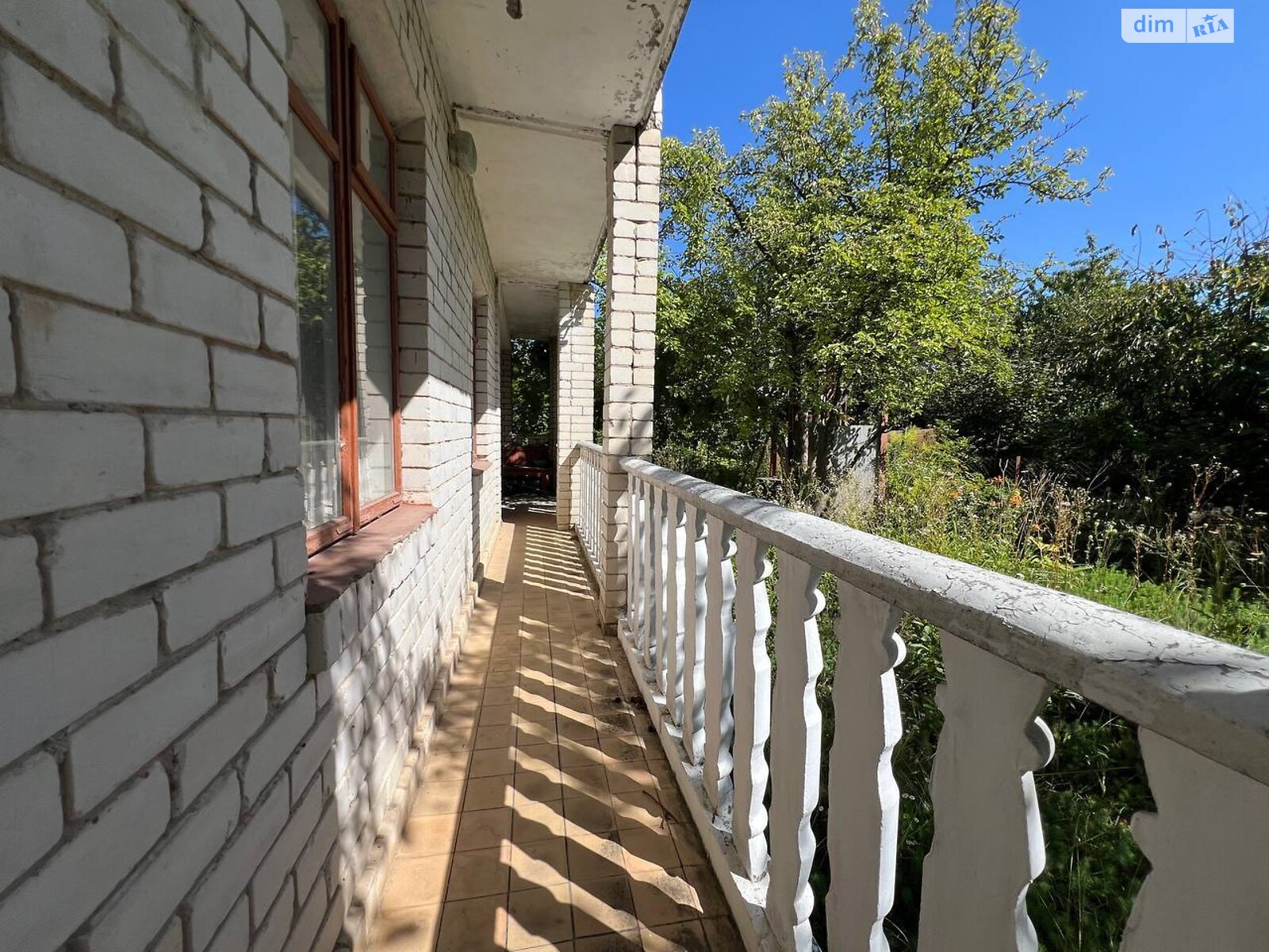 двухэтажный дом с гаражом, 109 кв. м, кирпич. Продажа в Выдровые Долы фото 1