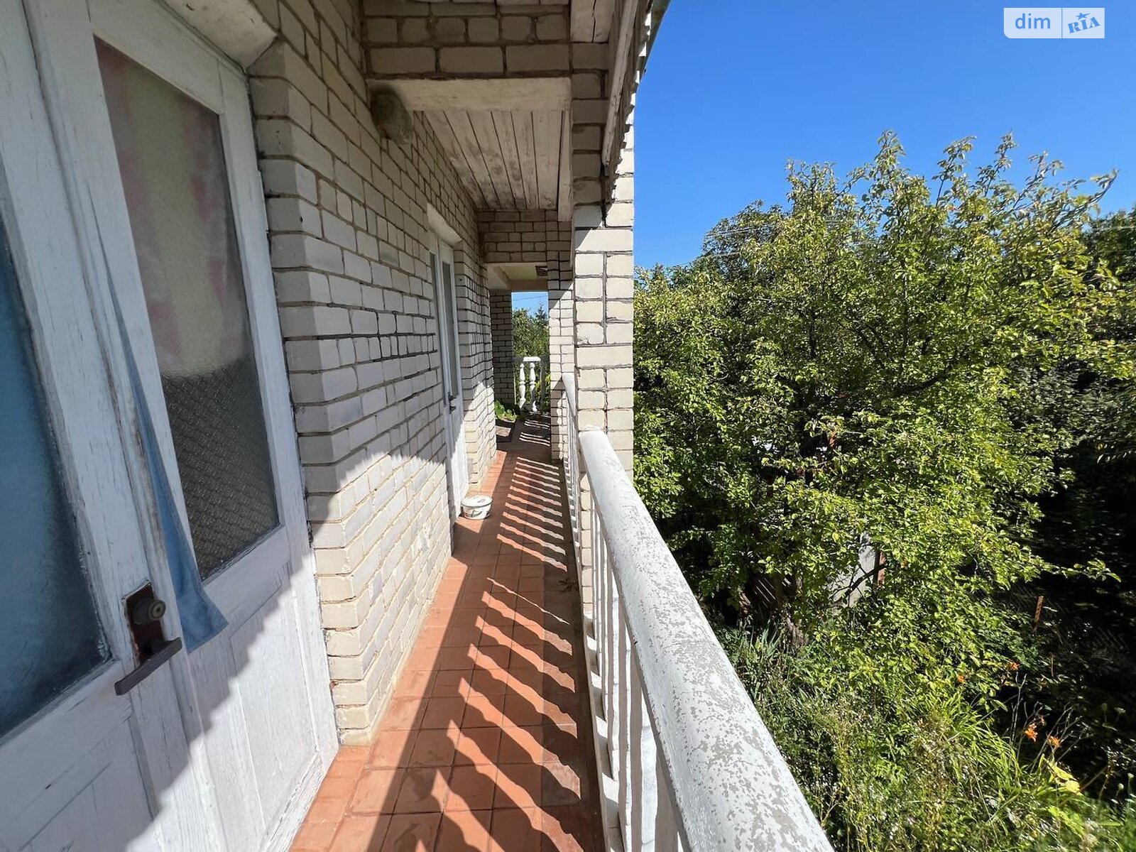 двухэтажный дом с гаражом, 109 кв. м, кирпич. Продажа в Выдровые Долы фото 1