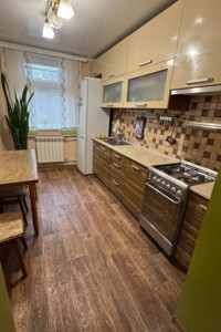 одноэтажный дом с гаражом, 80 кв. м, кирпич. Продажа в Запорожье район Коммунарский фото 2