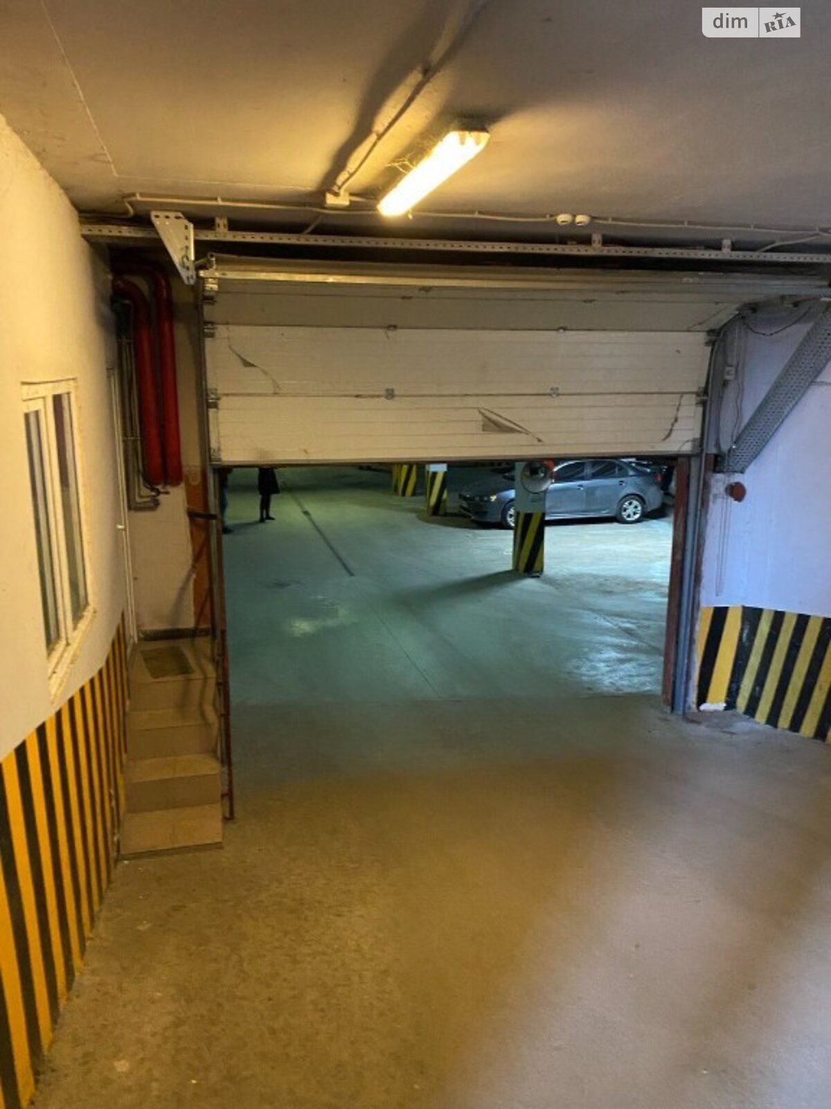 Місце в підземному паркінгу під легкове авто в Дніпрі, площа 18 кв.м. фото 1