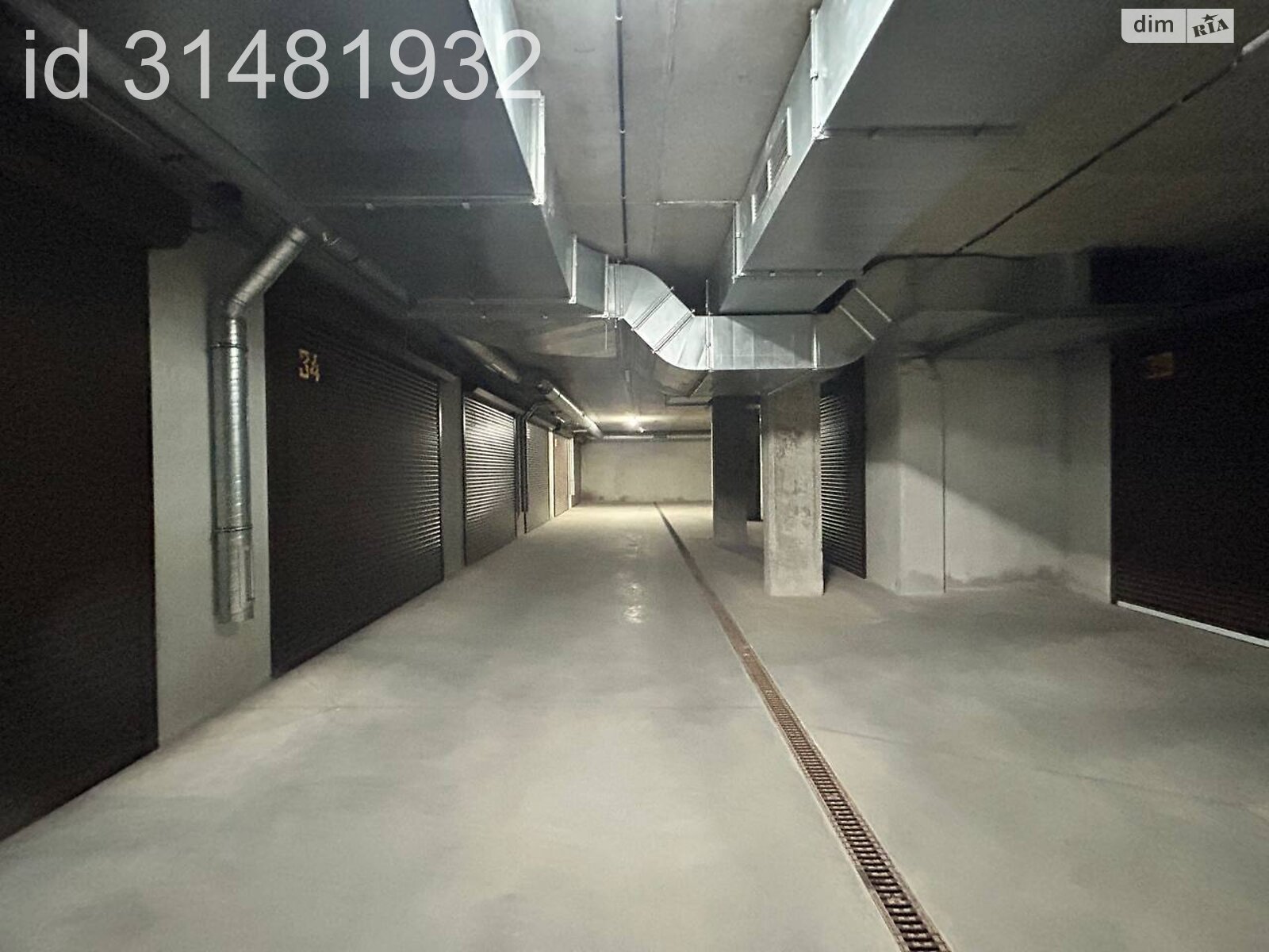 Место в подземном паркинге под легковое авто в Хмельницком, площадь 22.7 кв.м. фото 1