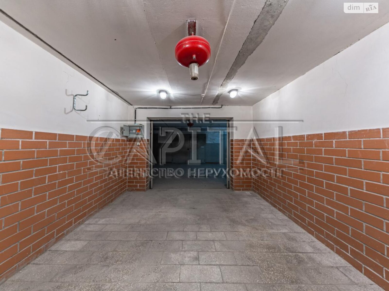 Место в подземном паркинге под легковое авто в Киеве, площадь 20 кв.м. фото 1