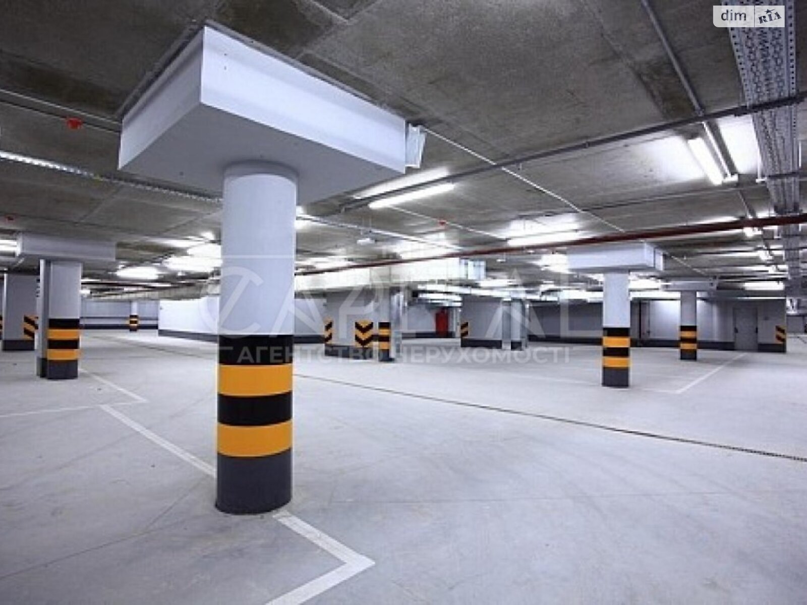 Место в подземном паркинге под легковое авто в Киеве, площадь 19 кв.м. фото 1