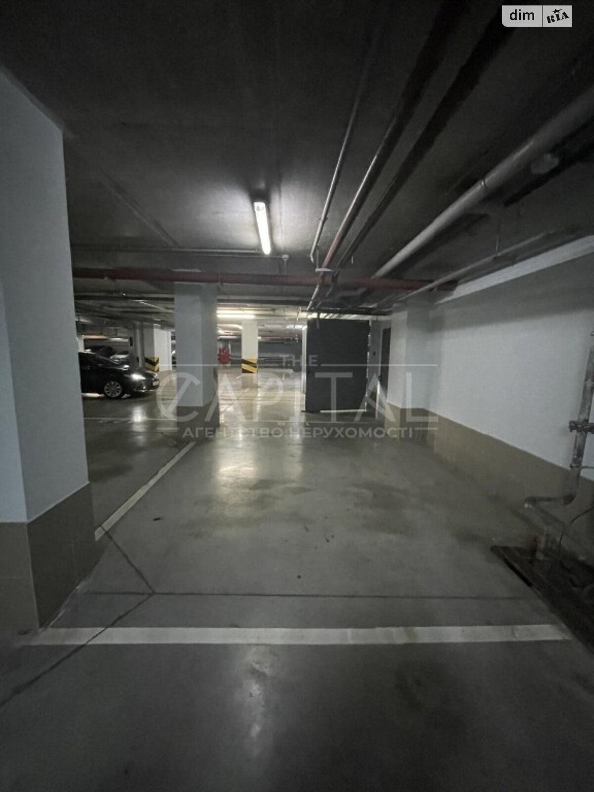 Место в подземном паркинге под легковое авто в Киеве, площадь 18 кв.м. фото 1