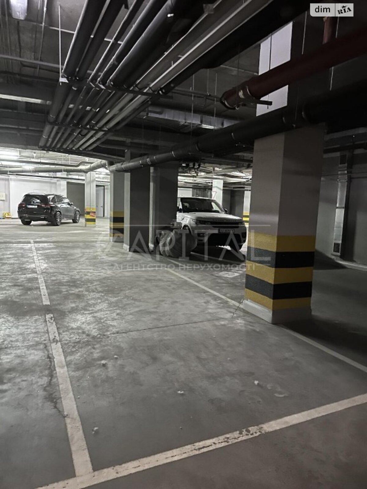 Место в подземном паркинге под легковое авто в Киеве, площадь 14 кв.м. фото 1