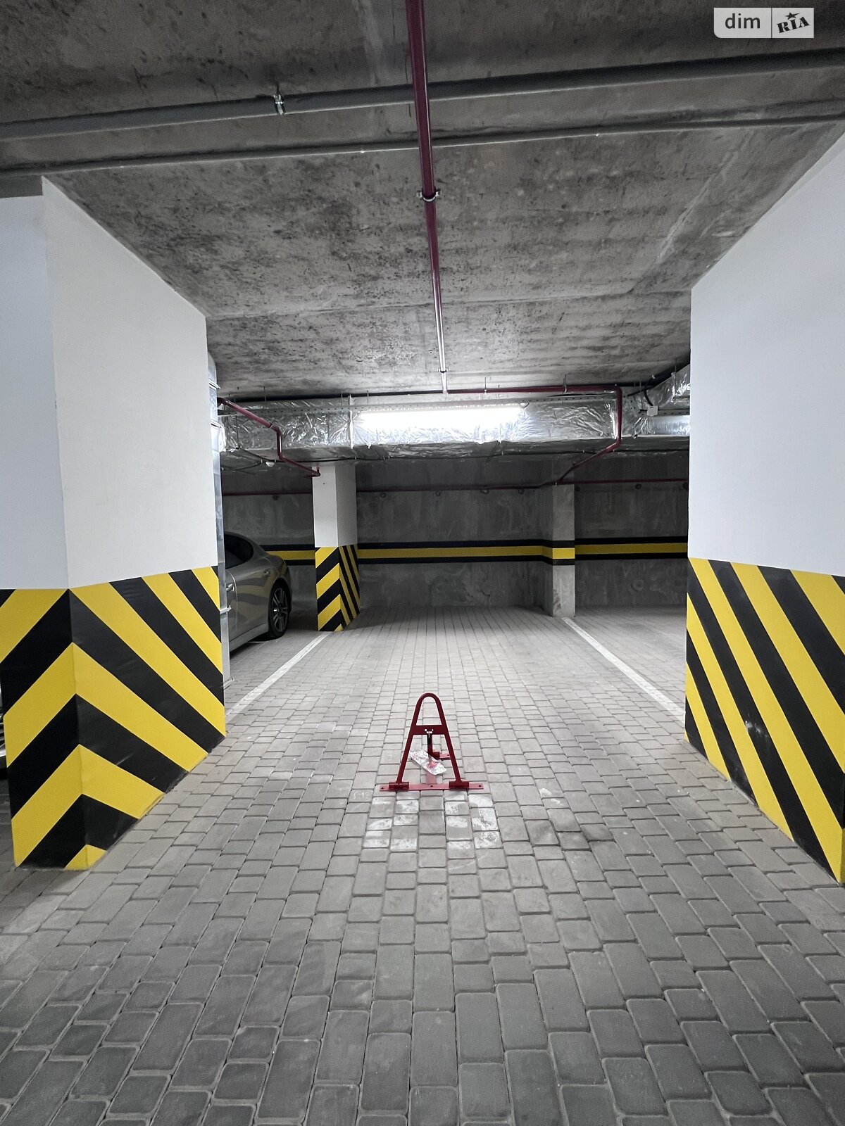 Место в подземном паркинге под легковое авто в Виннице, площадь 19 кв.м. фото 1