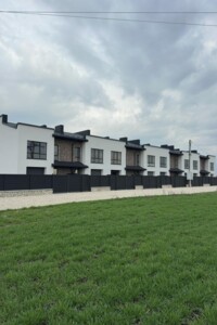 двухэтажный таунхаус, 134.5 кв. м, кирпич. Продажа в Байковцах фото 2