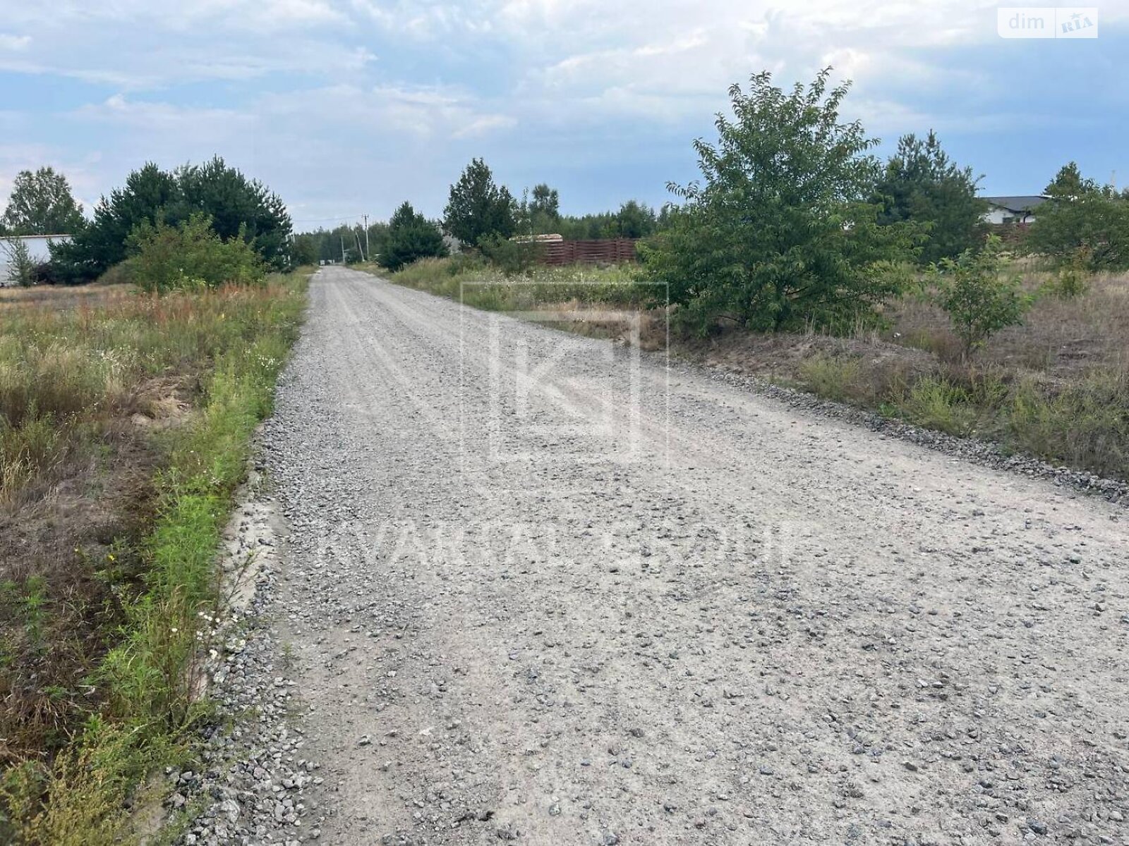 Земельный участок под жилую застройку в Дмитровке, площадь 13 соток фото 1 Земельный участок под жилую застройку в Дмитровке, площадь 13 соток фото 1
