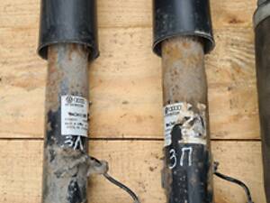 Амортизатор задний левый