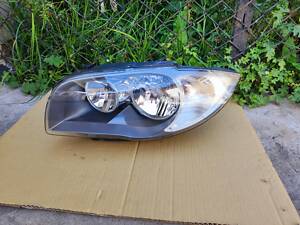 б/у фара ЛЕВАЯ галоген фара ліва BMW 1 Series 2007-2013 год рестайлинг E81 E82 E87 E88 Valeo 89317591 // 63117193387-03