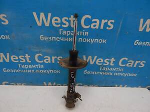 Б/в Амортизатор передній лівий 2.2D на Nissan X-Trail 2001-2007