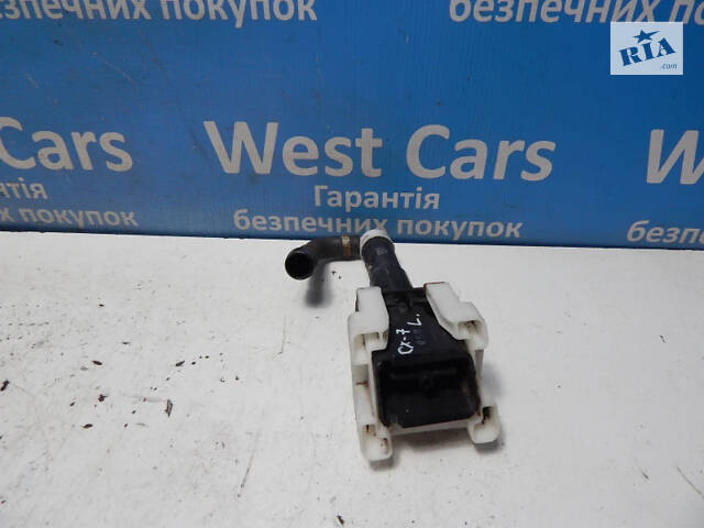 Б/в Форсунка омивача фари ліва на Mazda CX-7 2006-2012