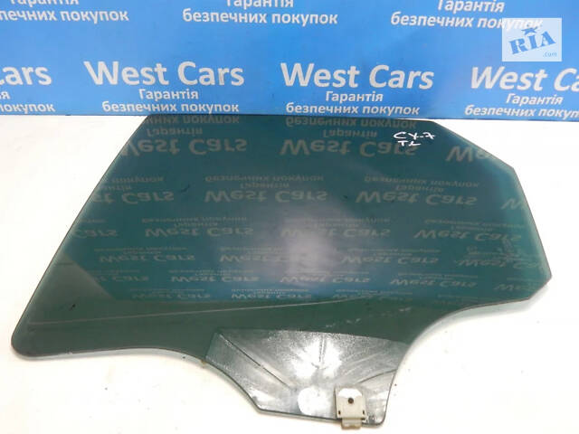 Б/в Скло задніх лівих дверей заводське тонування на Mazda CX-7 2006-2012