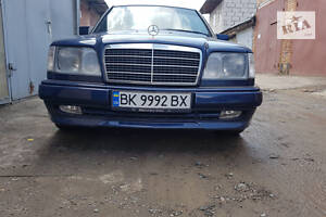 Бампер передний Mercedes E-class W124 (1LS 201 612-011)