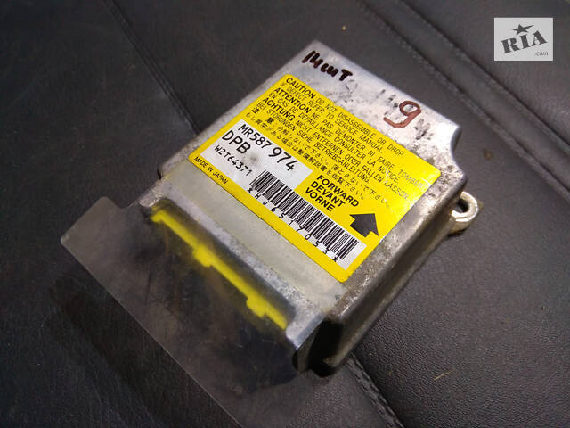 Блок управління подушками безпеки (ЕБУ AIRBAG) Mitsubishi L200 (2006-2015) - MR587974, W2T64371