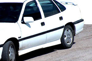 Боковые юбки Спорт (под покраску) для Opel Vectra A 1987-1995 гг