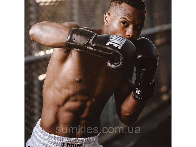 Боксерські рукавиці Leone GN111 THE GREATEST Black 10 унцій (бинти 4 м. в комплекті) - Фото 9