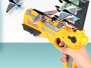 Дитячий іграшковий пістолет з літачками Air Battle катапульта з літаючими літаками (AB-1). Колір: жовтий