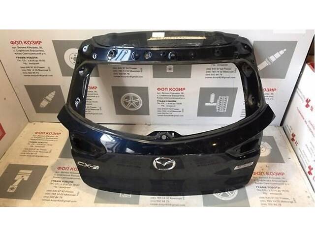 DKY06202XB КАПЮШОК ЗАДНІХ ДВЕРЕЙ MAZDA CX-3 NEW OE!