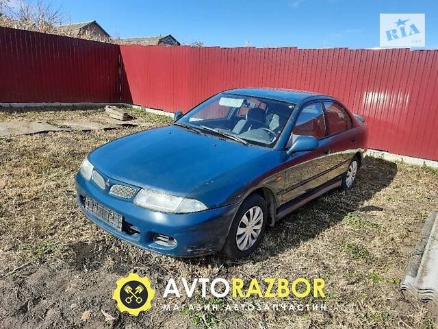 Дверь передняя левая до рестайлинг MR125463, MR125465 на Mitsubishi Carisma 1995-1999 год