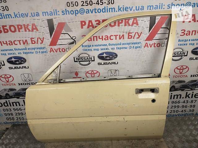 Дверь передняя левая жёлтая Nissan Sunny 87 8010160M30