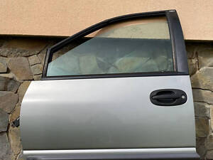 Двері передні ліві водія Chrysler Voyager 3 III голі
