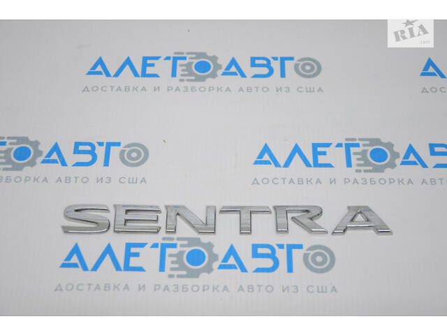 Эмблема надпись SENTRA крышки багажника Nissan Sentra 13-19