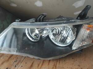 Фара ліва б/в Mitsubishi Outlander XL 2007-2012 8301A159