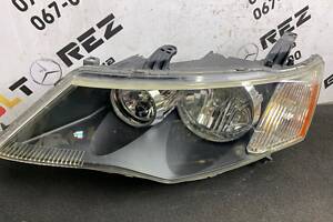 Фара левая Mitsubishi Outlander XL 05-09 8301A703