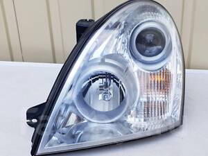 Фара ліва Rexton 06-12 (SsangYong)