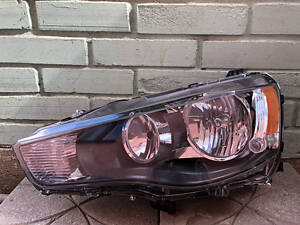 Фара ліва для Mitsubishi Outlander XL 2007-2012 (Fps) галоген