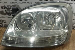 Фара ліва галоген Nissan Almera Tino 964323