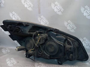Фара левая Hella Renault Scenic 2 2003-2006 158103-00li