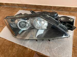 Фара передняя правая Mazda CX-7, 2009-2012, ксенон, Европа, оригинал, б/у, EH1051030, ДЕФЕКТ.