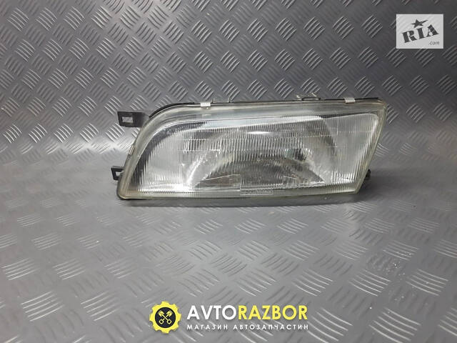 Фара передняя левая 260601N725 на Nissan Almera N15 1995-2000 год