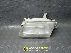 Фара передняя левая с электрокорректором BC5E51040, BC5E-51-040 на седан Mazda 323 BA 1994-1998 год