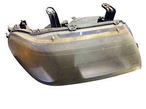 Фара правая MR566770 MITSUBISHI Pajero Sport 99-09