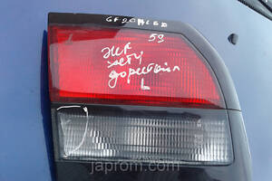 Фонарь крышки багажника левый Mazda 626 GF 1997-2000г.в. 5 дв. хетчбек дефект