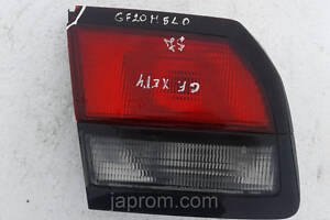 Ліхтар кришки багажника лівий Mazda 626 GF 1997-2002г.в. 5 м хетчбек дефект