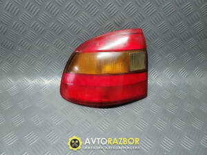 Фонарь, стоп сигнал задний левый 1222003, 90442020 на седан Opel Astra F 1991-1998 год