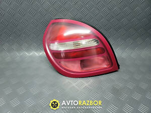 Фонарь стоп сигнал задний левый хэтчбек 26555BM411, 26555BN011 на Nissan Almera II N16 2000-2003 год