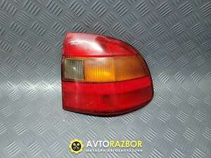 Фонарь, стоп сигнал задний правый 1222006, 90442021 на седан Opel Astra F 1991-1998 год