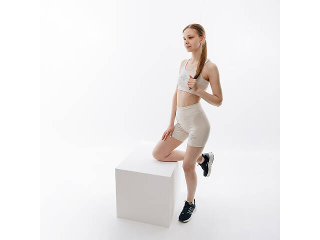 Жіночі Шорти New Balance Essentials Reimagined Arch. Бежевий XS (7dWS31504MBM XS) - Фото 1