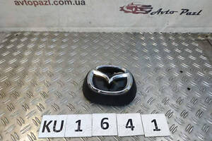 KU1641 D10J51730 емблема перед (є сколи) Mazda CX3 15- 0