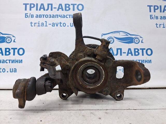 Поворотный кулак левый с маточиной Mitsubishi L200 KB 2.5 DIESEL 4D56 2006 (б/у) - Фото 1