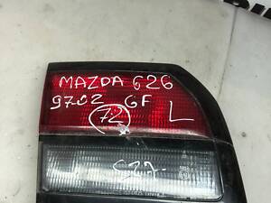 Ліхтар кришки багажника лівий Mazda 626 GF 1997-2002 5-дв. хетчбек