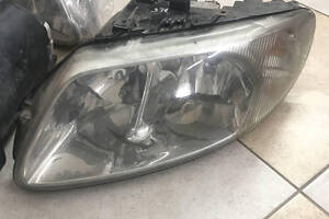 Левая фара Chrysler Voyager 2001-2004гг 04857703AB