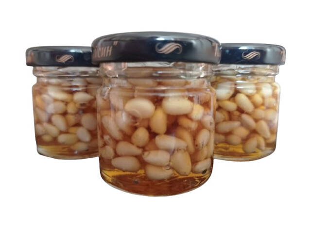 Мед з горішками асорті (кедрові, фісташки, кешью) - Фото 1